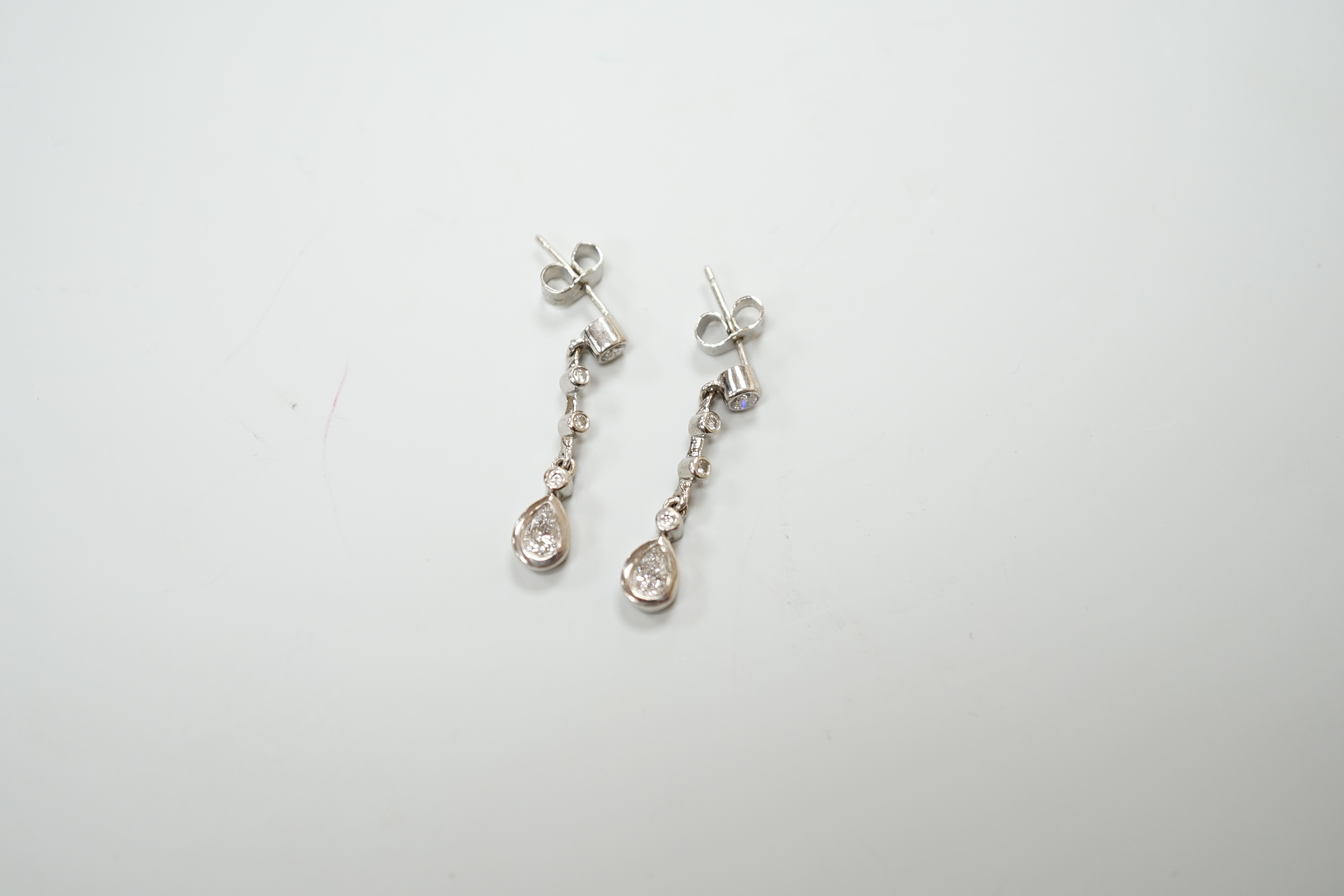 A pair of 18K white gold and diamond drop earrings, 2.75cm, gross 3.9 grams